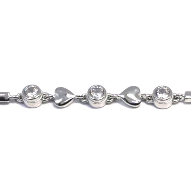 Silver white stone heart bracelet with 3 buttons